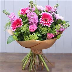    A PINK HANDTIED flowers of the day 