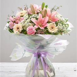     A PASTEL HANDTIED florist choice