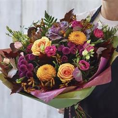    A NO LILY HANDTIED florist choice 