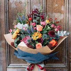   A INDIAN SUMMER HANDTIED   florist choice